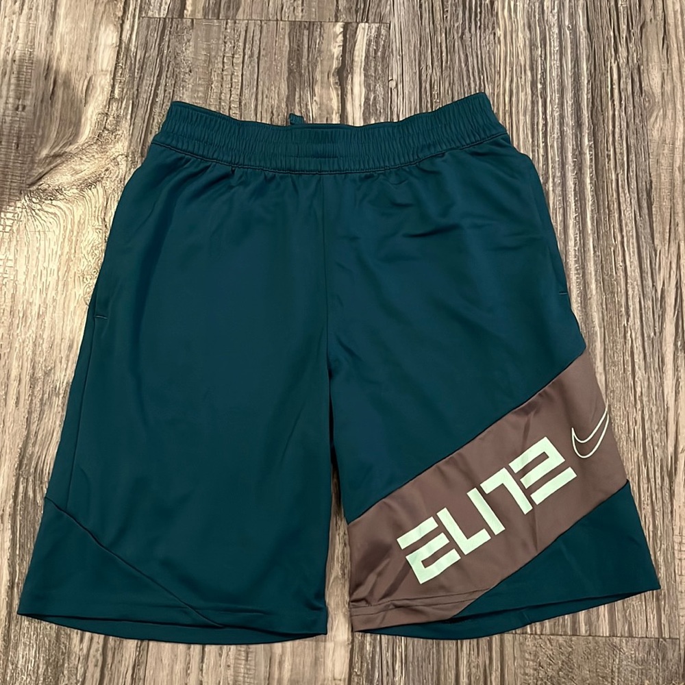 Green and grey nike elite basketball shorts.